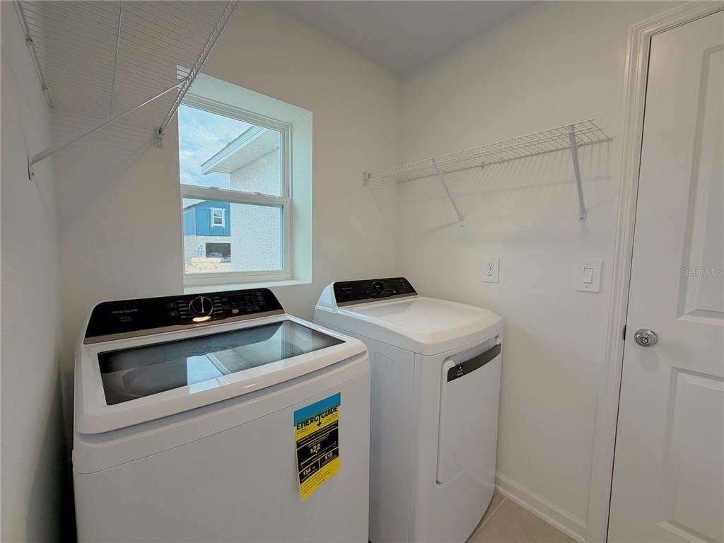2154 Lasso Loop Eagle Lake, FL 33839 - Photo 15 of 32 a utility room with dryer and washer