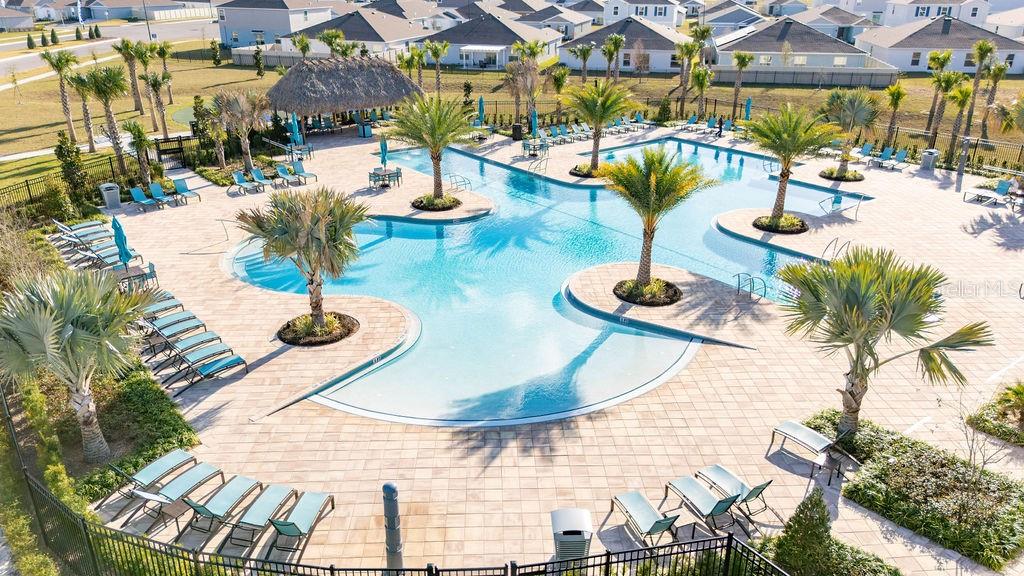 2154 Lasso Loop Eagle Lake, FL 33839 - Photo 18 of 32 a view of a swimming pool with outdoor seating