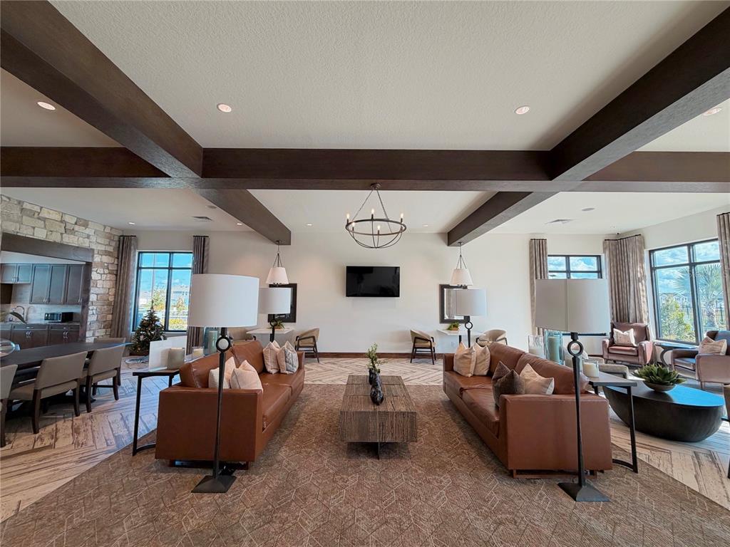 2154 Lasso Loop Eagle Lake, FL 33839 - Photo 25 of 32 a living room with furniture and a large window