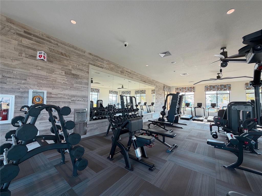 2154 Lasso Loop Eagle Lake, FL 33839 - Photo 27 of 32 a view of a room with gym equipment