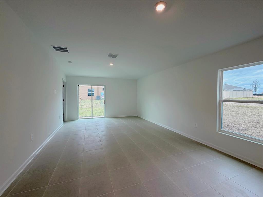 2154 Lasso Loop Eagle Lake, FL 33839 - Photo 7 of 32 a view of empty room with window