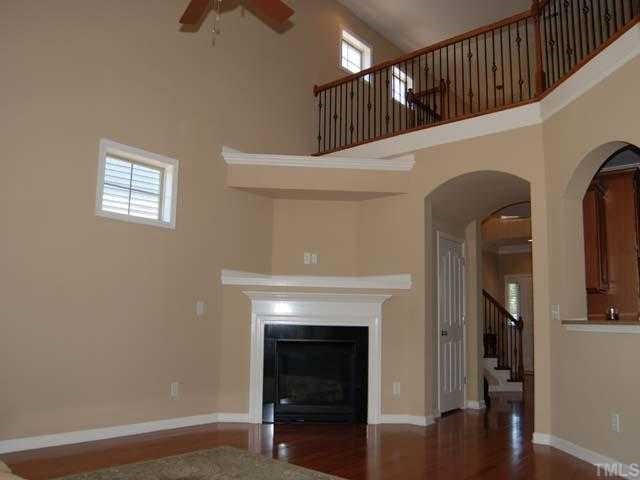 6227 Oconner Street Raleigh, NC 27617 - Photo 3 of 11 a view of entryway and hall with wooden floor