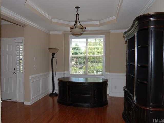 6227 Oconner Street Raleigh, NC 27617 - Photo 6 of 11 a room with a table and a window