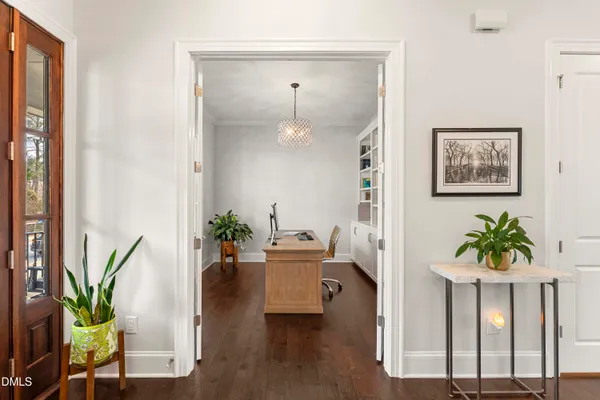 a large kitchen with stainless steel appliances granite countertop a lot of counter space and a sink