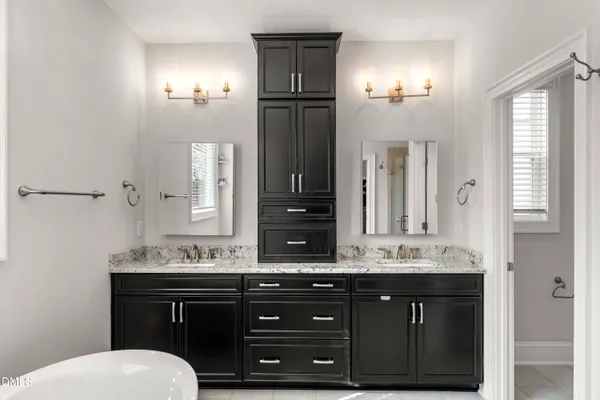 a bathroom with a sink and a shower