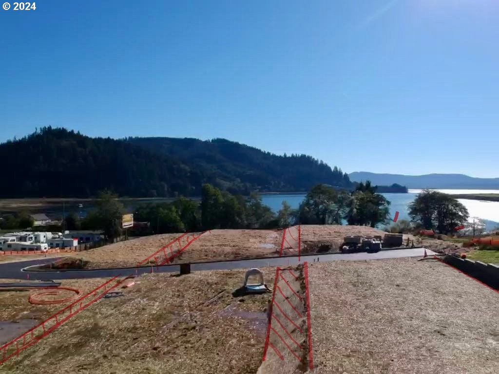501 Garibaldi Avenue, Unit 7 Garibaldi, OR 97118 - Photo 15 of 25 a view of car parked on street with two car parked on road