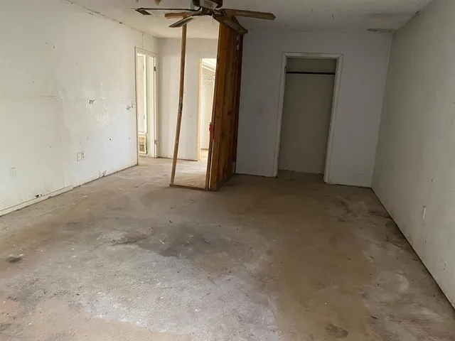 an empty room with closet