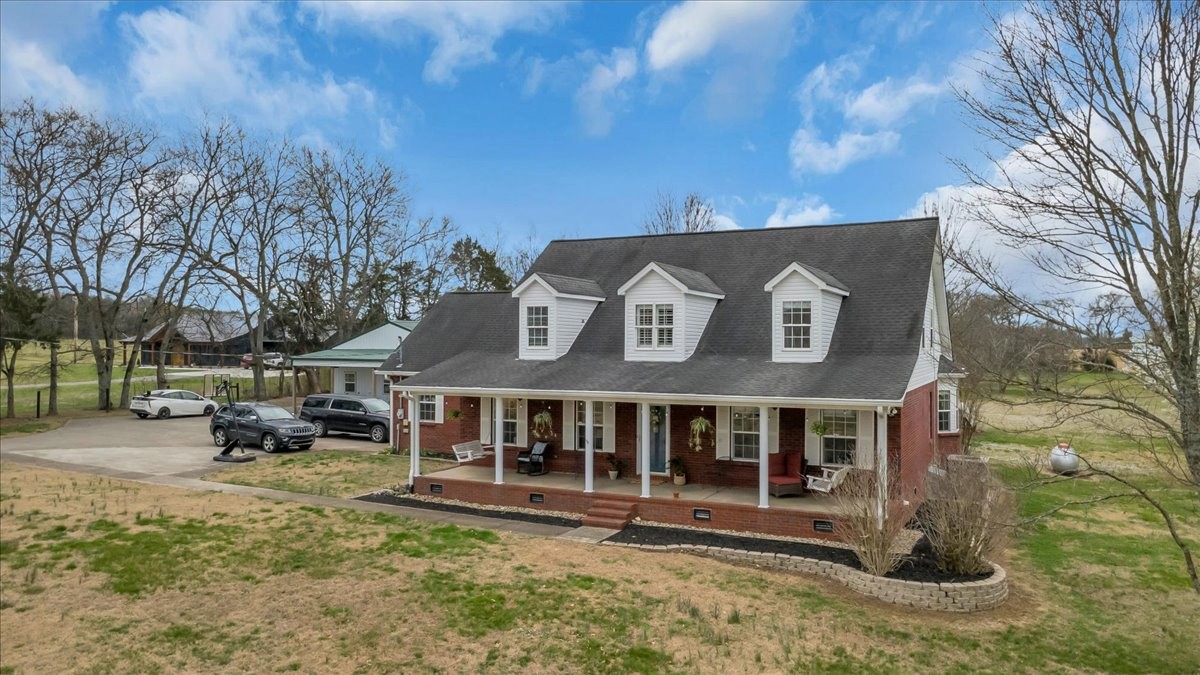 310 Edd Joyce Road Bell Buckle, TN 37020 - Photo 2 of 67 a view of a house with a yard
