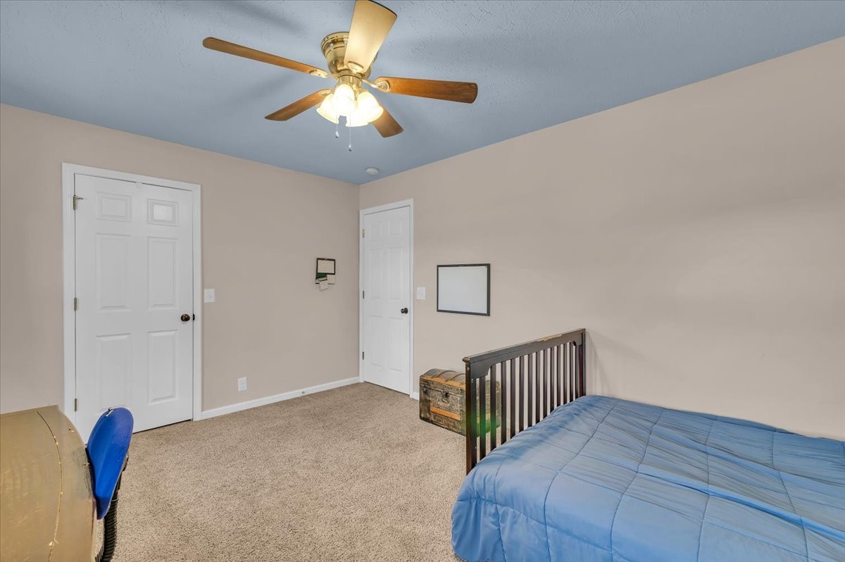310 Edd Joyce Road Bell Buckle, TN 37020 - Photo 37 of 67 a view of hallway with a chandelier fan