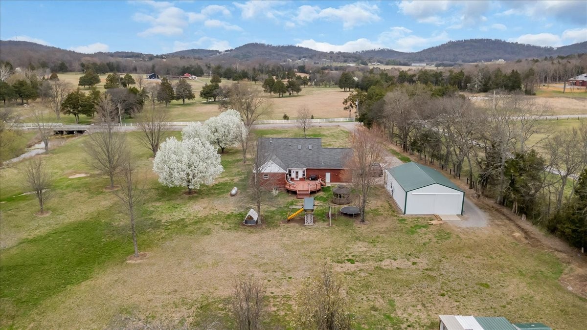 310 Edd Joyce Road Bell Buckle, TN 37020 - Photo 57 of 67 a view of a lake with a mountain