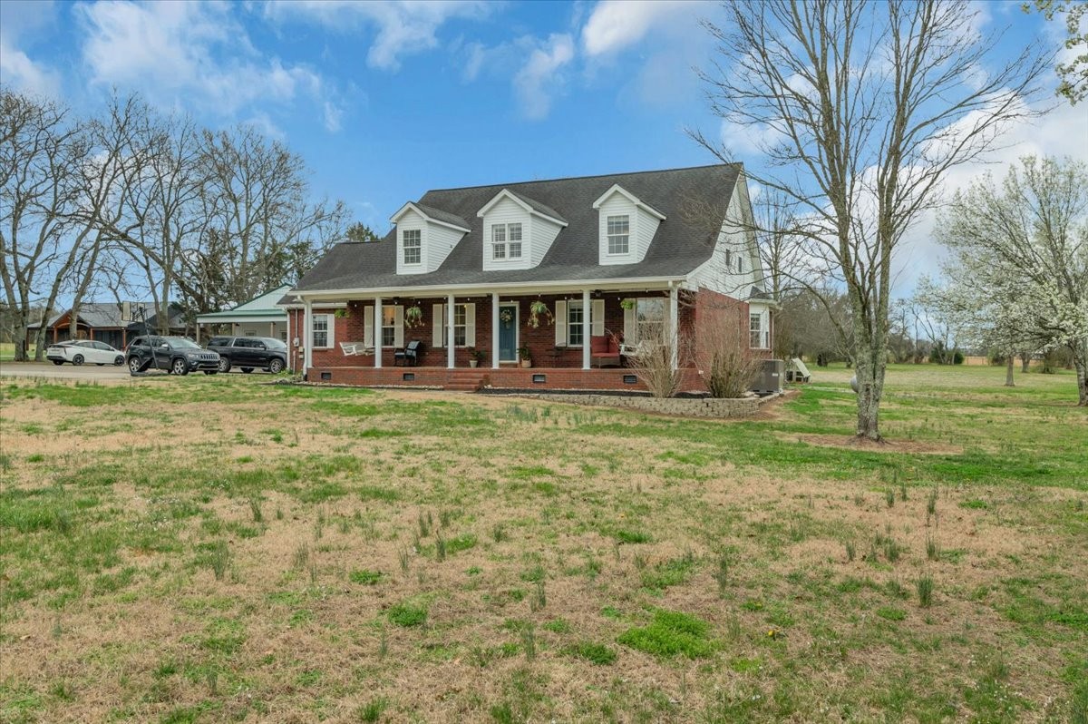 310 Edd Joyce Road Bell Buckle, TN 37020 - Photo 61 of 67 a view of a house with a yard