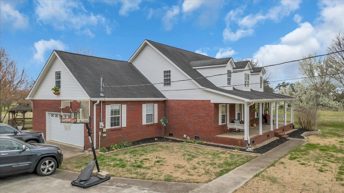 310 Edd Joyce Road Bell Buckle, TN 37020 - Photo 62 of 67 a view of a white house