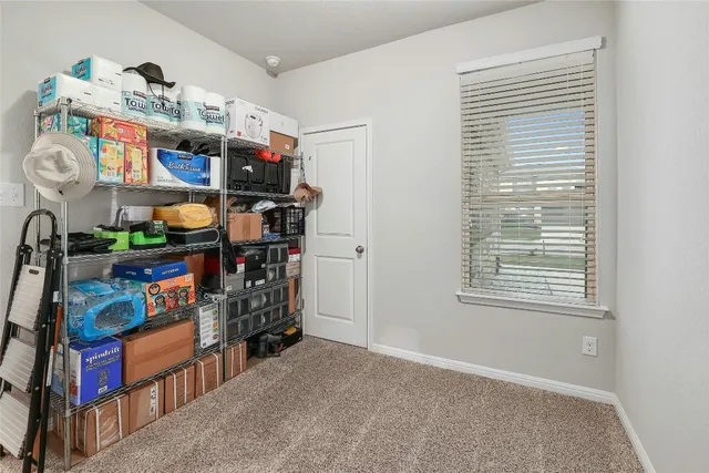 a view of room with furniture and a flat screen tv