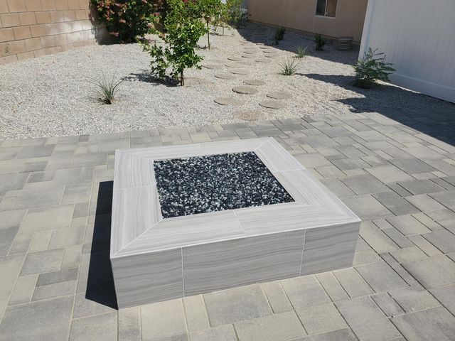 a white bath tub sitting in a bathroom