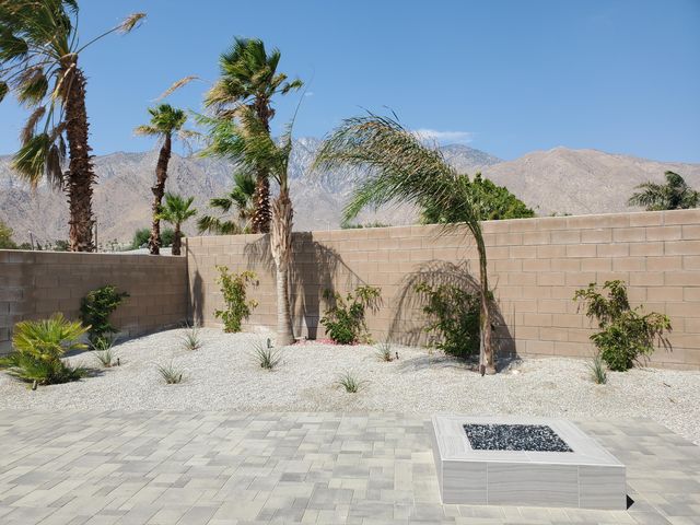 a view of entryway with flower pots