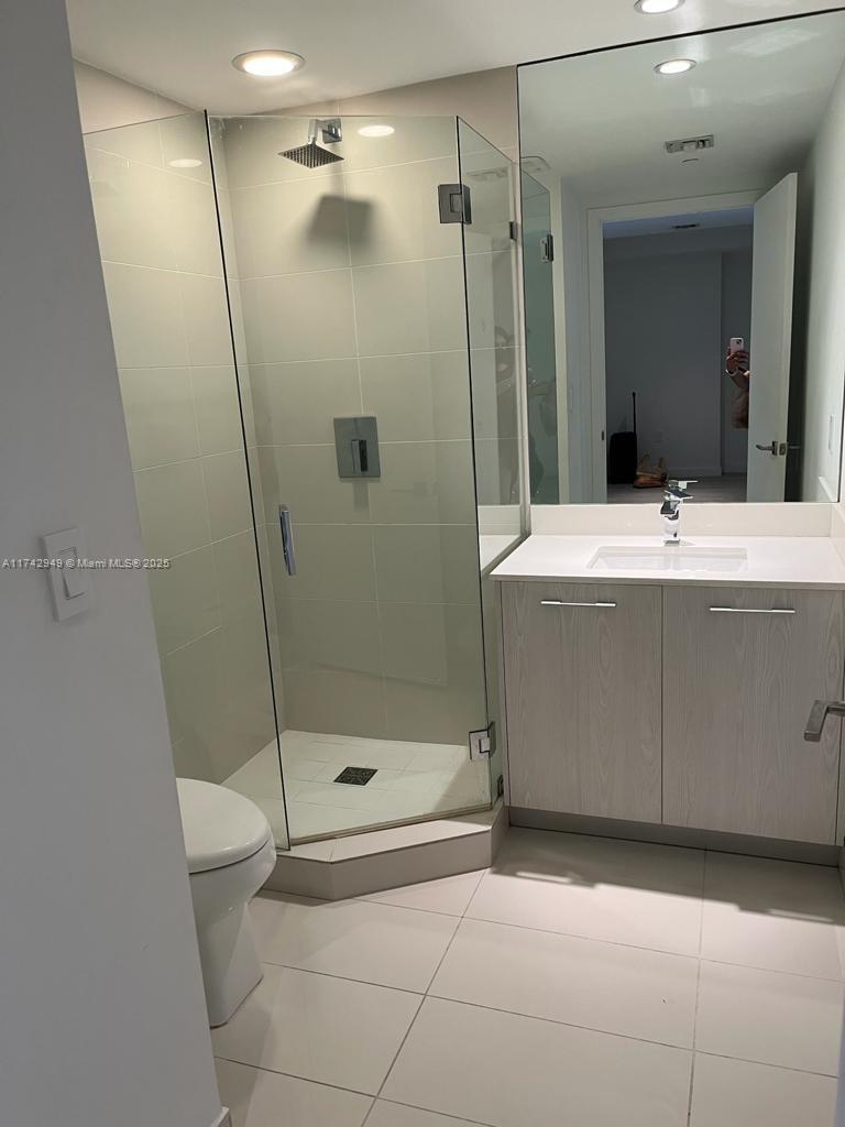Brickell Heights II Miami, FL 33130 - Photo 7 of 7 a bathroom with a shower and a sink