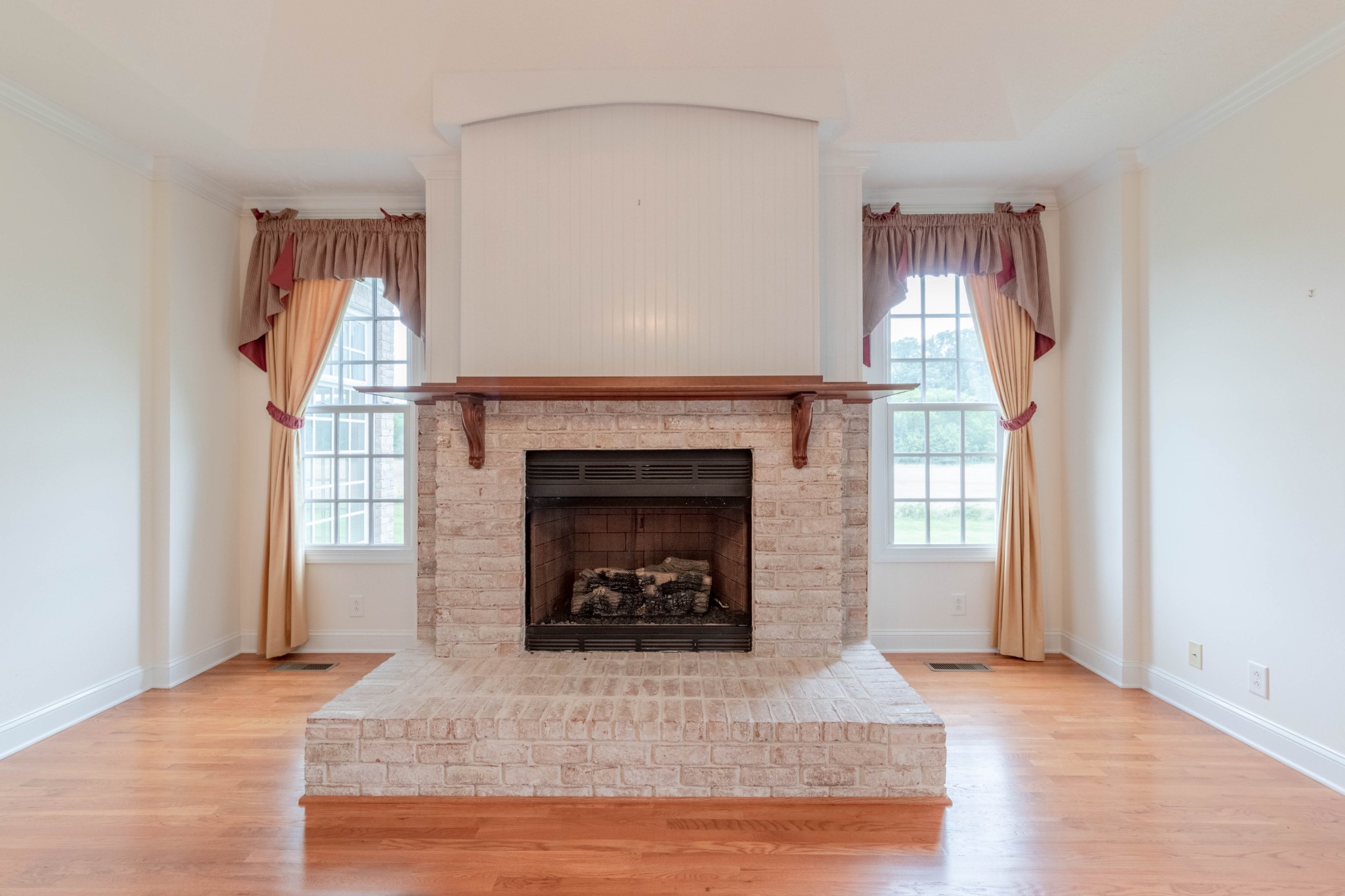 563 Pond Apple Road Clarksville, TN 37043 - Photo 16 of 39 a living room with a fireplace and a fireplace