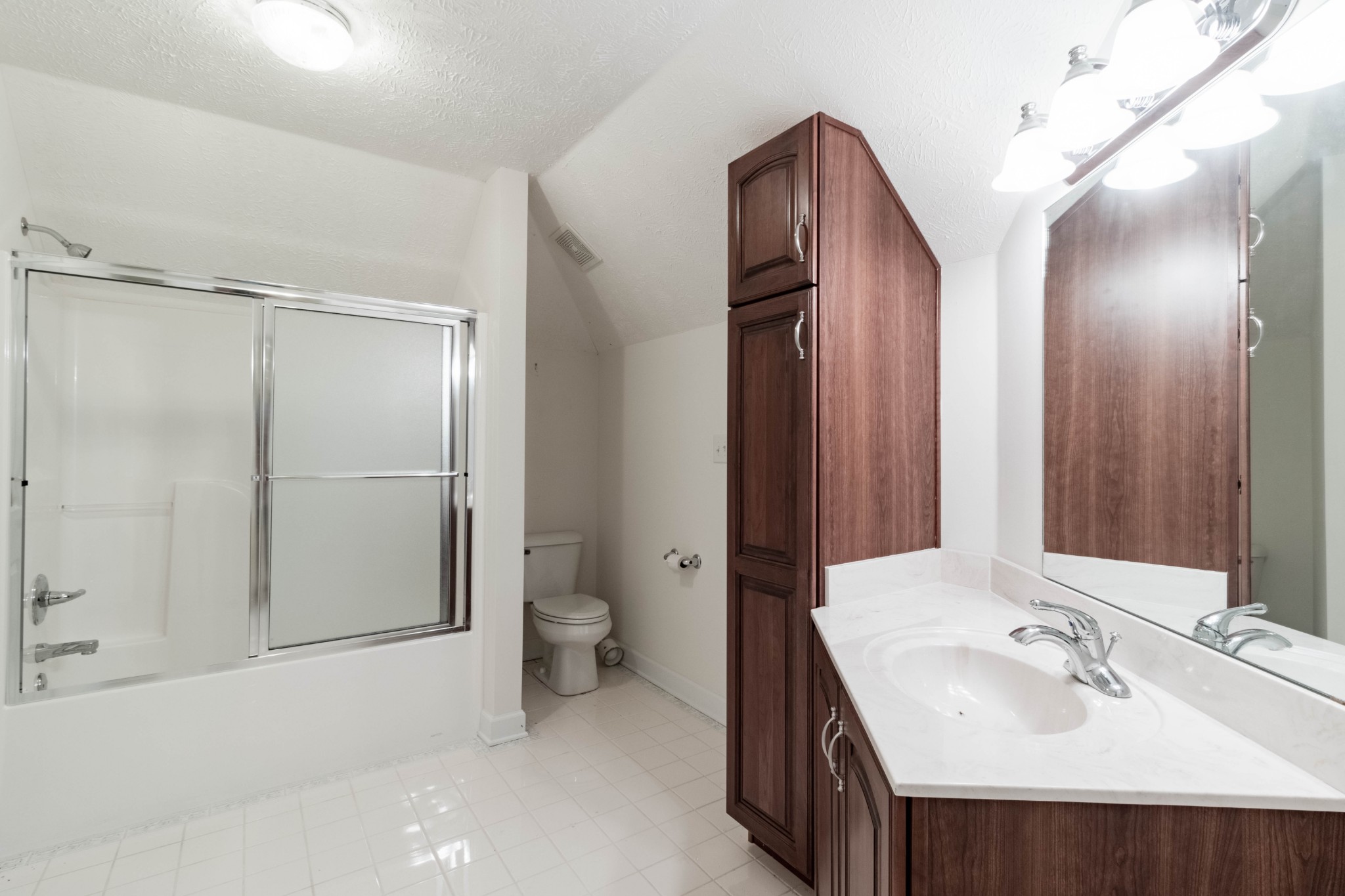 563 Pond Apple Road Clarksville, TN 37043 - Photo 32 of 39 a bathroom with a sink and mirror with toilet