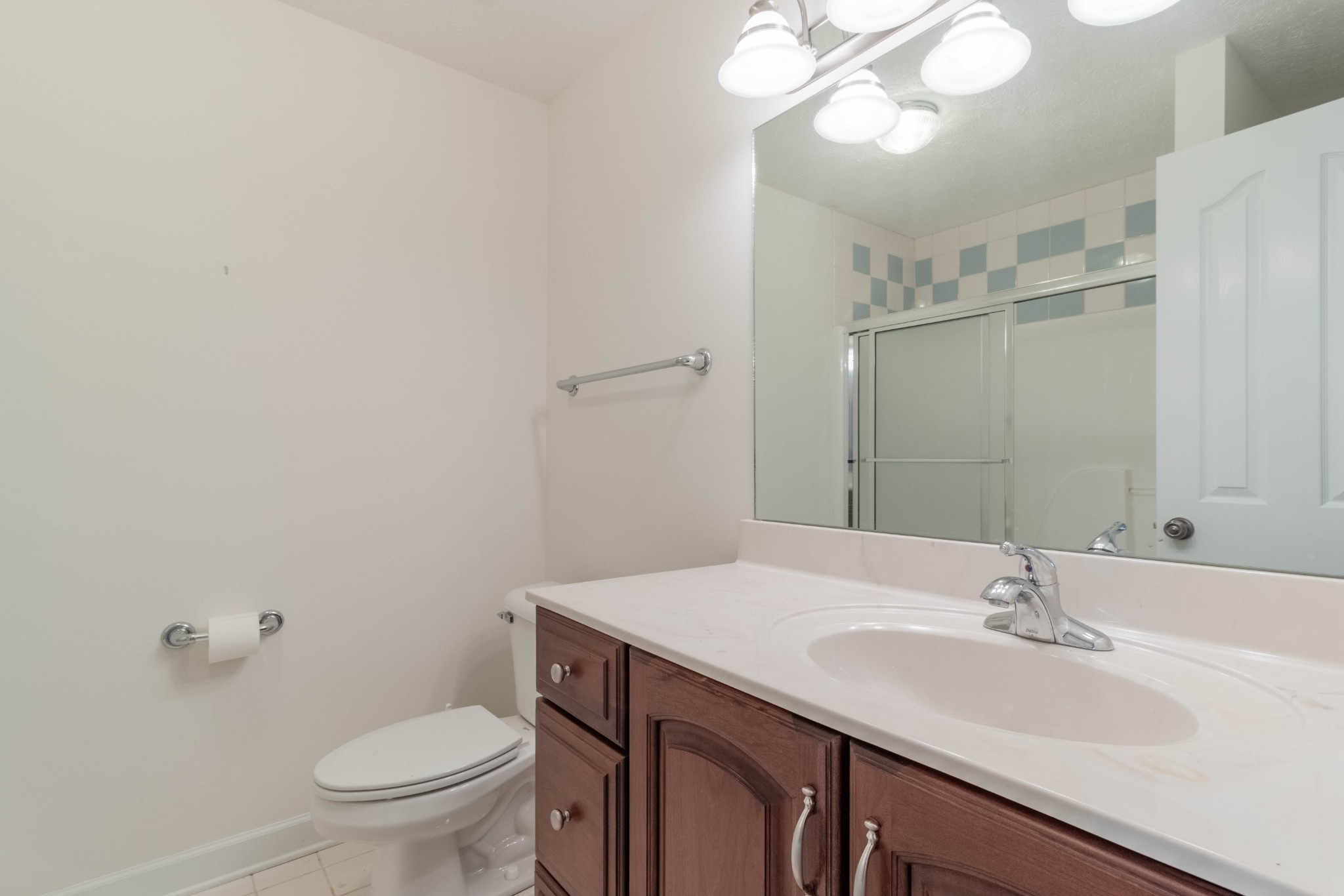 563 Pond Apple Road Clarksville, TN 37043 - Photo 34 of 39 a bathroom with a sink a toilet and a mirror
