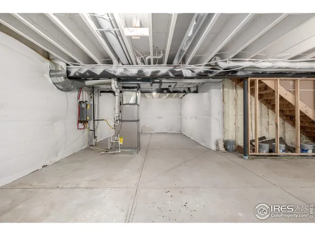 a view of a room with wooden walls