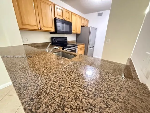 $2,300 | 10773 Cleary Boulevard, Unit 201, Plantation, FL 33324