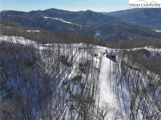 a view of a house with a mountain