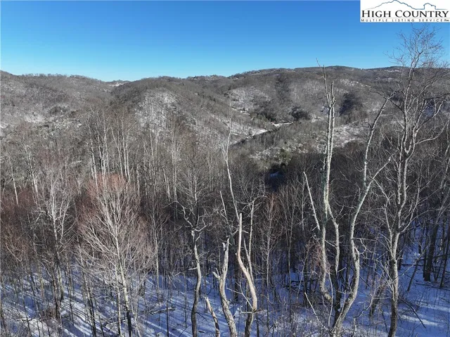 a view of a city with mountains