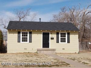 4334 South Polk Street Amarillo, TX 79110 - Photo 1 of 1 a front view of a house with a yard