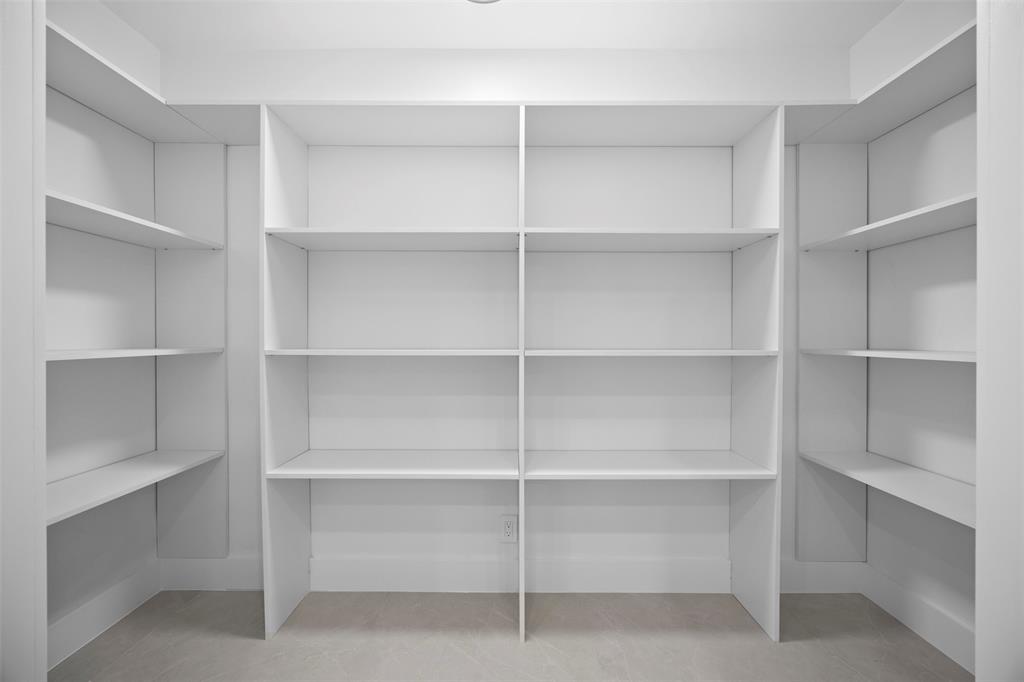 7571 Estrella Circle Boca Raton, FL 33433 - Photo 16 of 76 a view of walk in closet with empty racks