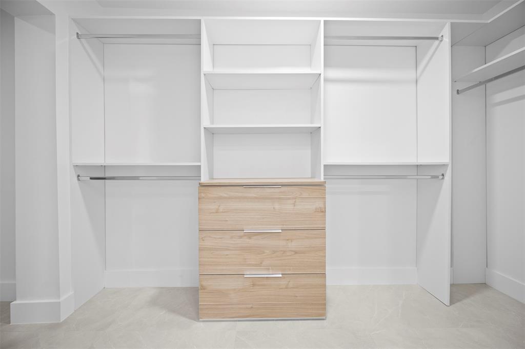 7571 Estrella Circle Boca Raton, FL 33433 - Photo 39 of 76 a view of walk in closet with empty racks