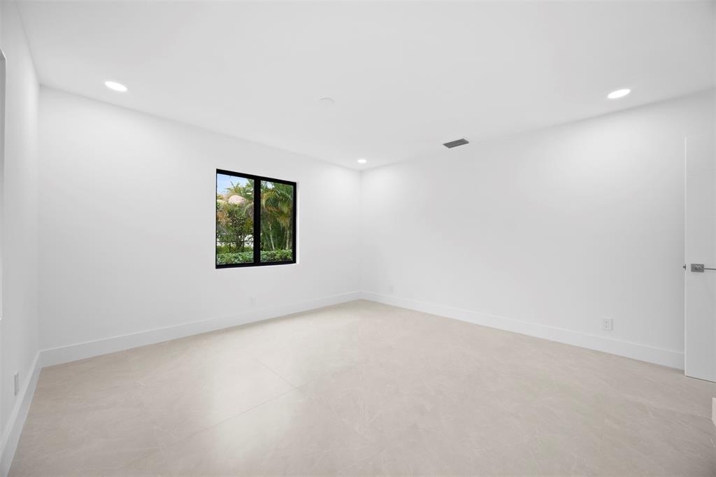 7571 Estrella Circle Boca Raton, FL 33433 - Photo 47 of 76 an empty room with windows