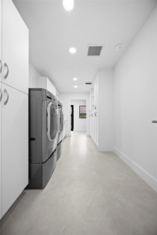 7571 Estrella Circle Boca Raton, FL 33433 - Photo 55 of 76 a view of a storage & utility room with washer and dryer