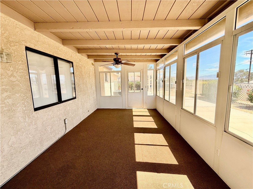 14890 Apple Valley Road Apple Valley, CA 92307 - Photo 19 of 28 a view of an empty room with a window
