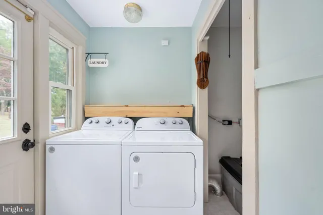 a utility room with dryer and washer