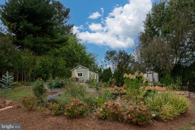 a view of a garden with a fountain