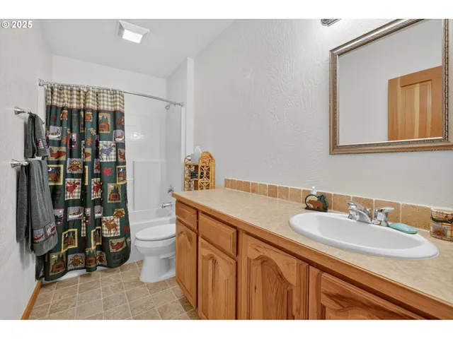 a view of livingroom with furniture and garden