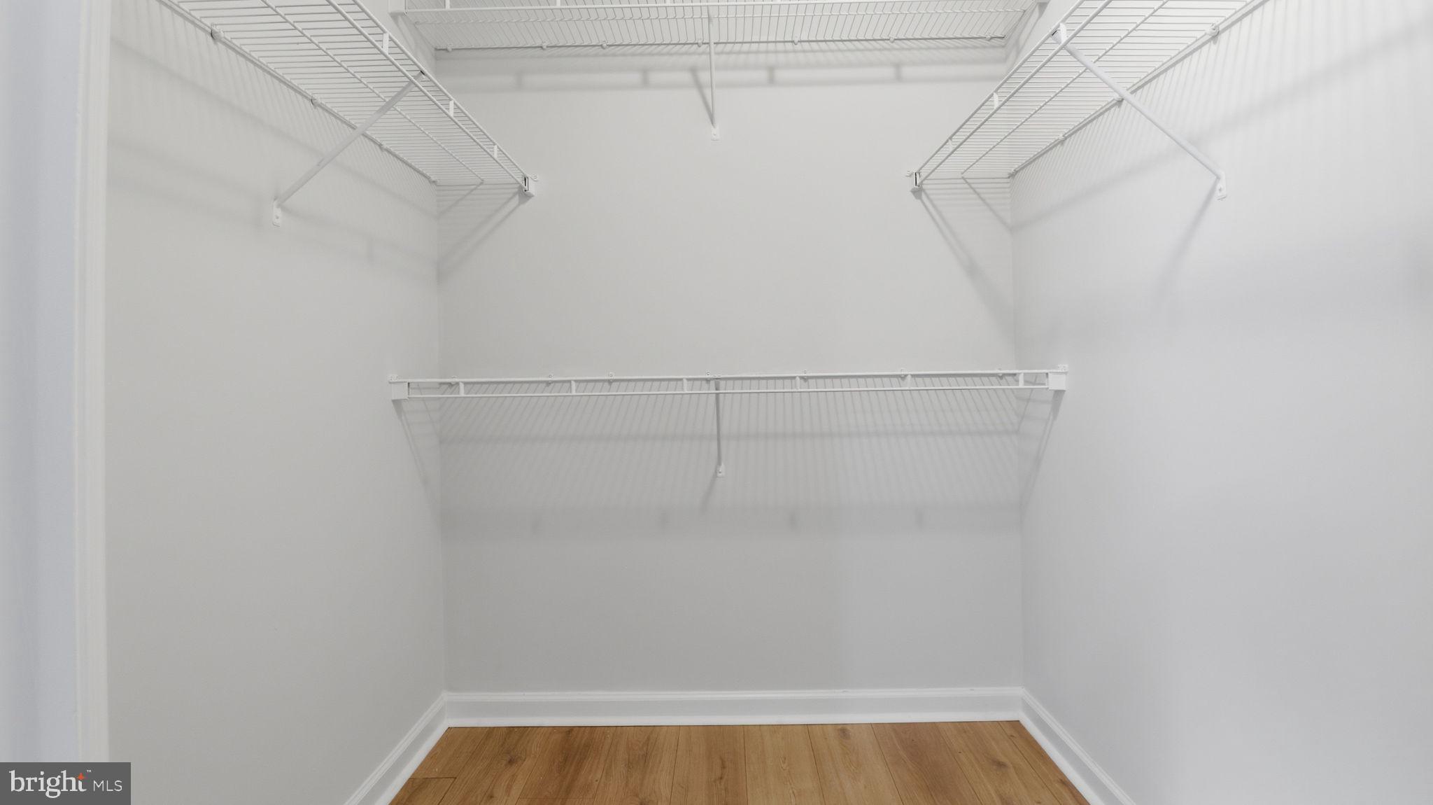1404 Pangbourne Way Hanover, MD 21076 - Photo 17 of 31 a view of a room with racks on the wall
