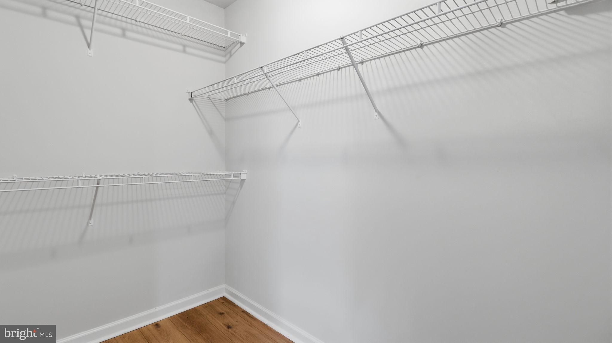 1404 Pangbourne Way Hanover, MD 21076 - Photo 18 of 31 a view of a room with racks on the wall