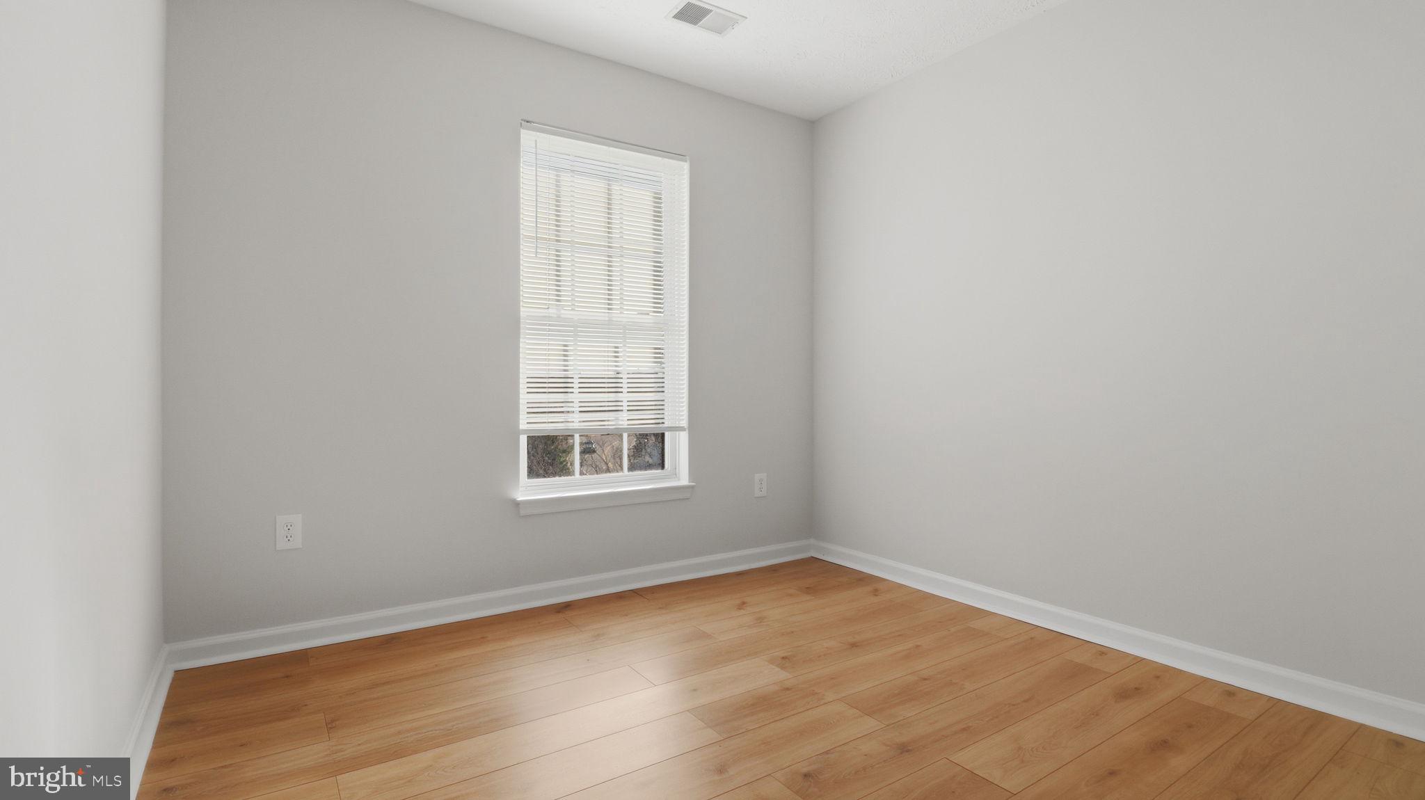 1404 Pangbourne Way Hanover, MD 21076 - Photo 20 of 31 an empty room with a window