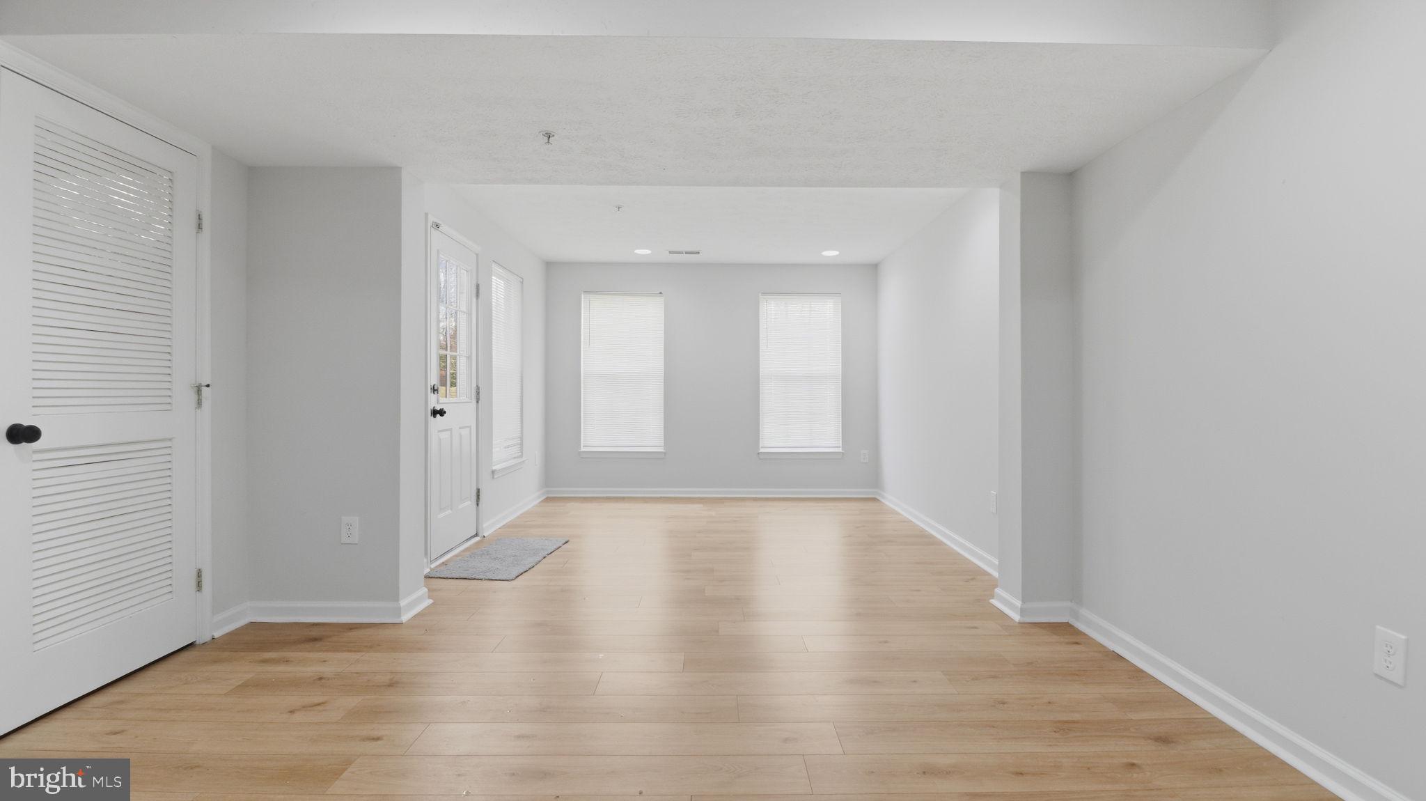 1404 Pangbourne Way Hanover, MD 21076 - Photo 24 of 31 a view of an empty room and glass door