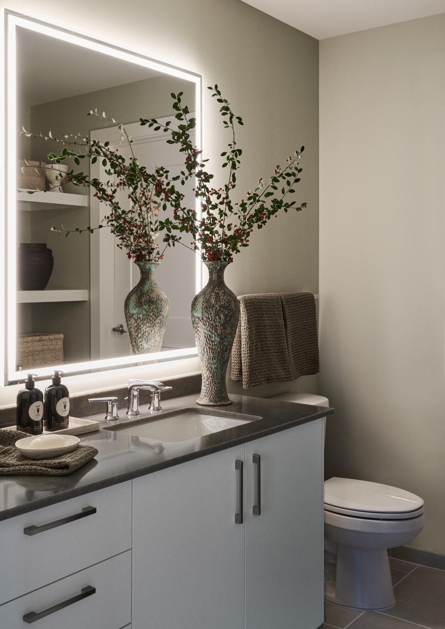 1212 Demonbreun Street, Unit B1 (B) Nashville, TN 37203 - Photo 8 of 26 a bathroom with a sink and mirror