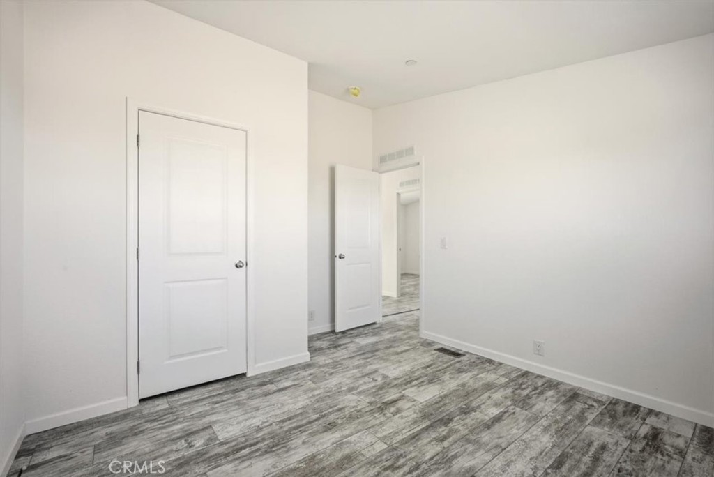 9622 Via Verde Avenue Pinon Hills, CA 92372 - Photo 22 of 48 a view of an empty room