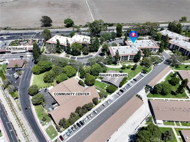 an aerial view of a city with lots of residential buildings
