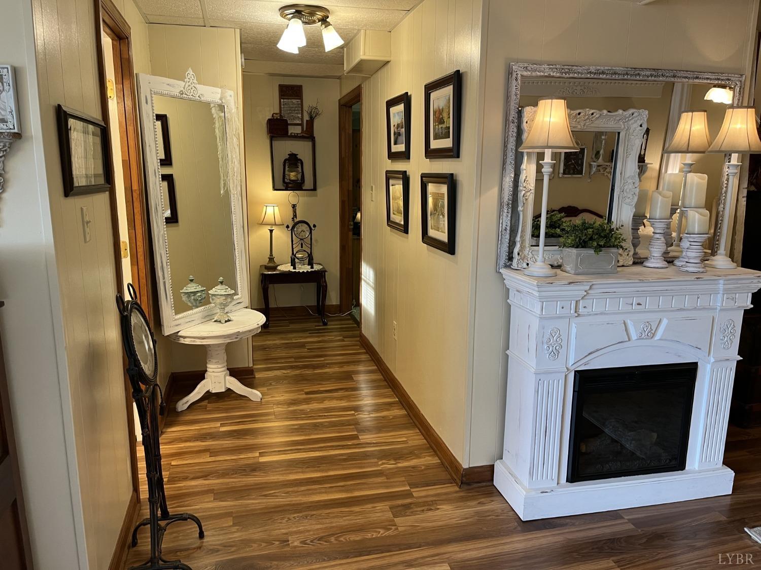 3912 Lowry Road Goode, VA 24556 - Photo 31 of 56 a bathroom with a sink a toilet and a mirror