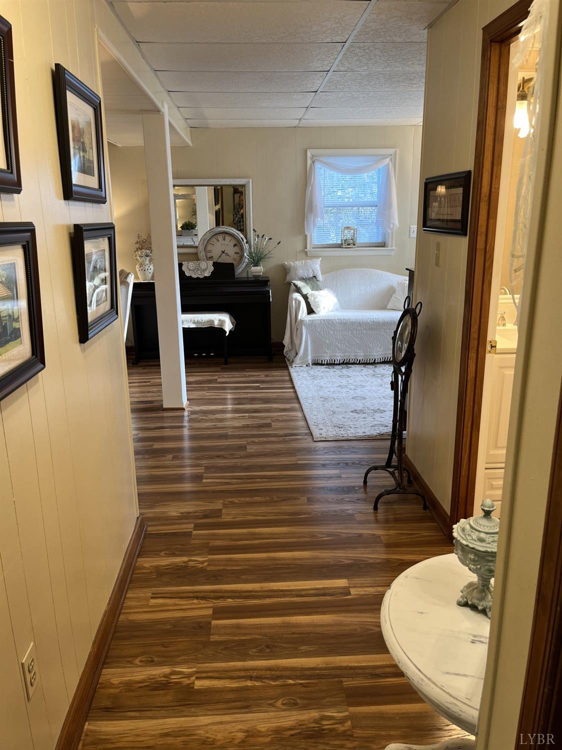3912 Lowry Road Goode, VA 24556 - Photo 32 of 56 a living room with furniture and a mirror