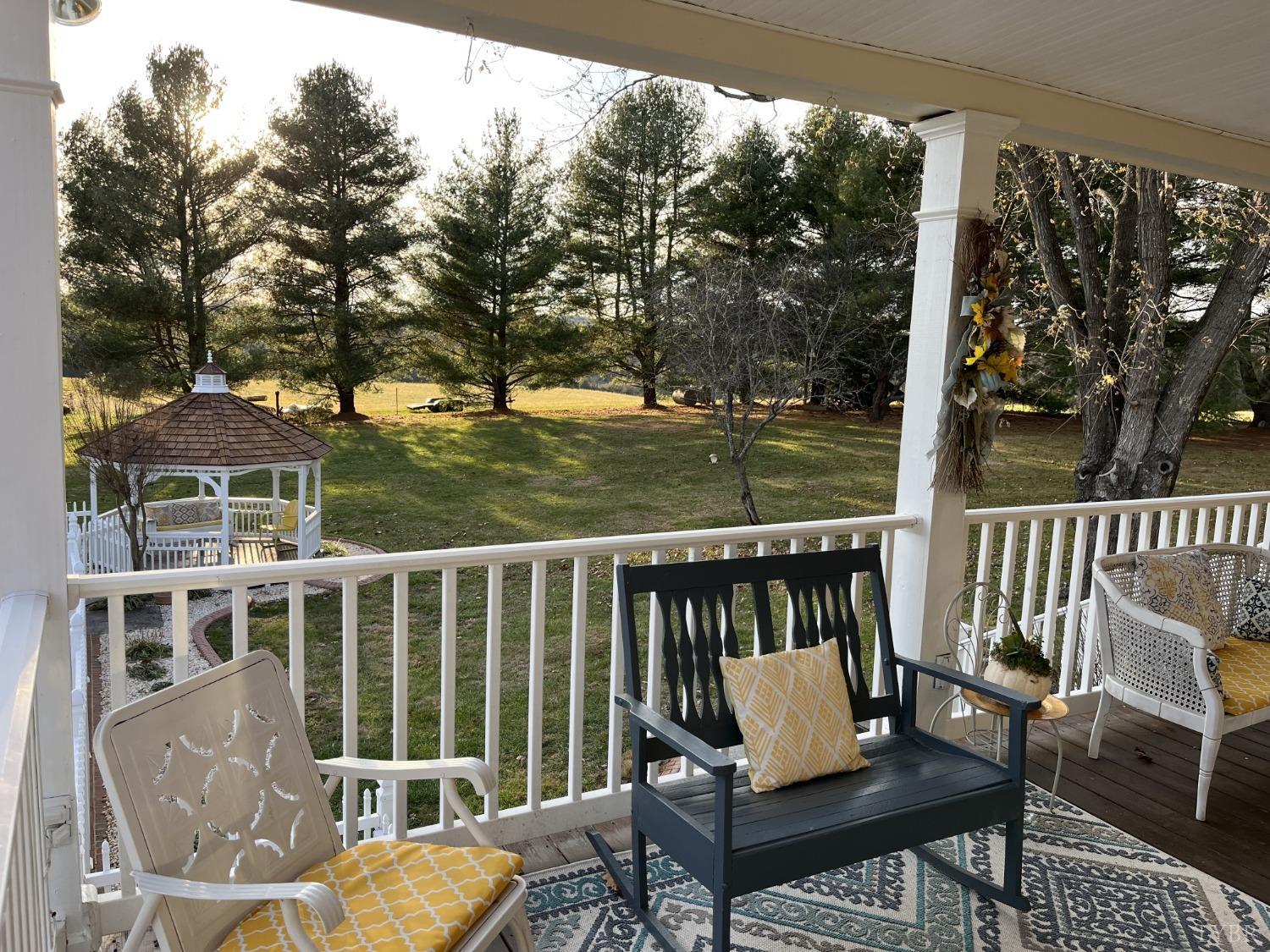 3912 Lowry Road Goode, VA 24556 - Photo 39 of 56 a view of a chairs in a deck