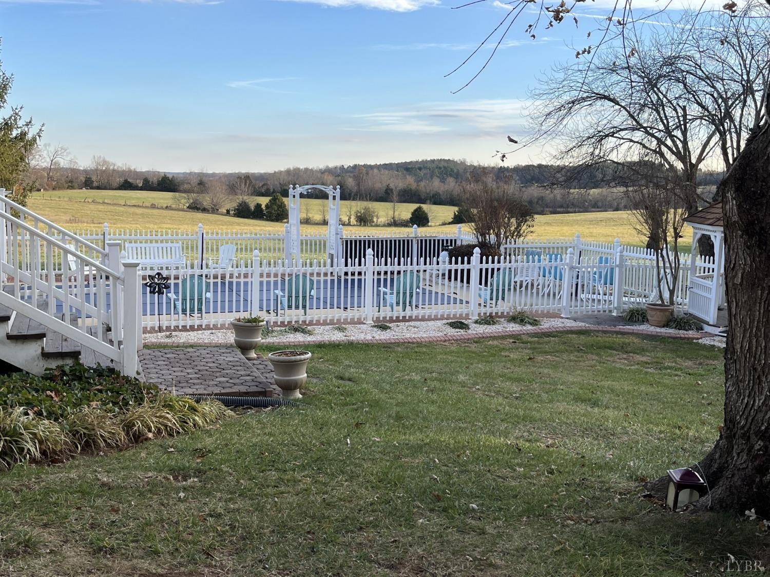 3912 Lowry Road Goode, VA 24556 - Photo 45 of 56 a view of a house with backyard and sitting area