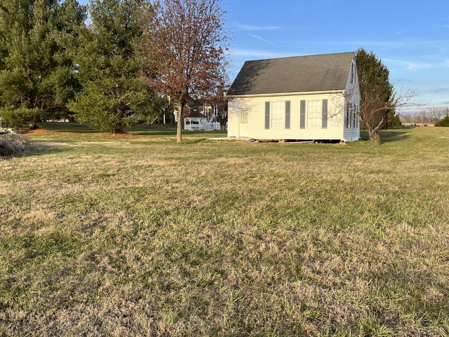 3912 Lowry Road Goode, VA 24556 - Photo 48 of 56 a front view of a house with a yard