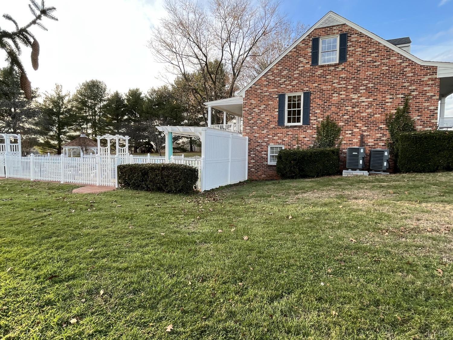 3912 Lowry Road Goode, VA 24556 - Photo 53 of 56 a front view of a house with a yard