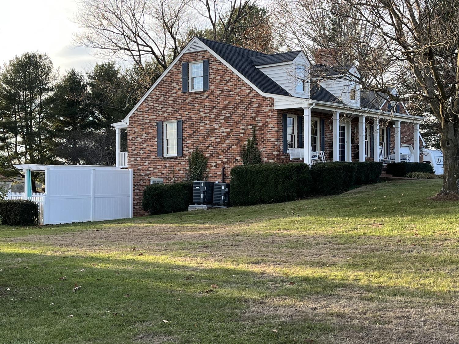 3912 Lowry Road Goode, VA 24556 - Photo 54 of 56 a front view of a house with a garden